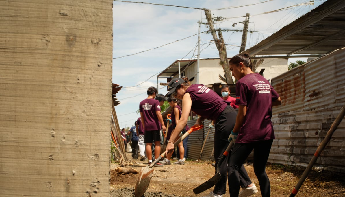 architecture students digging in the soil