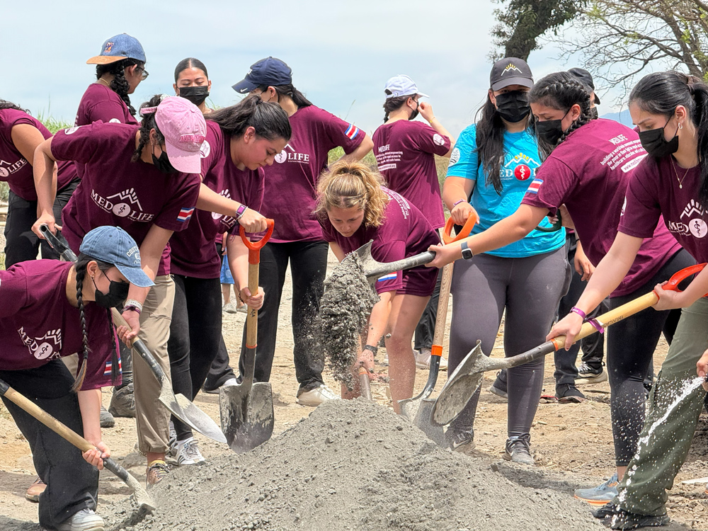 engineering students digging the soil